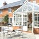 Conservatory and patio on a spring morning.